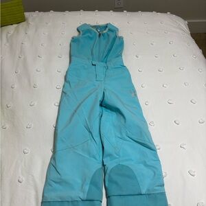 Spyder Light Blue Ski Bibs with pink jacket spyder set